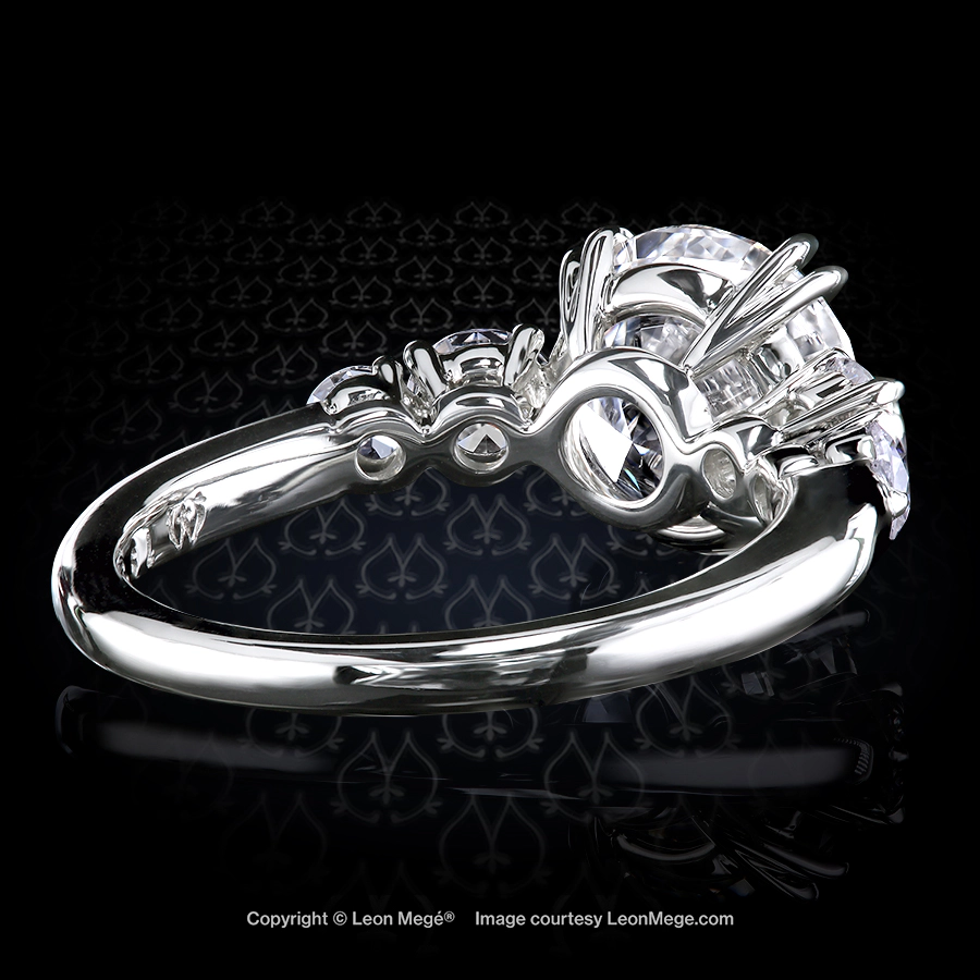 Leon Megé five-stone ring with an ideal-cut round diamond and graduated side stones set in platinum r7935