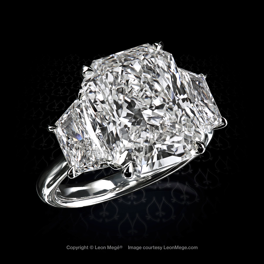 Leon Mege three-stone diamond ring with a 7.62 carat radiant cut diamond and brilliant diamond trapezoids.