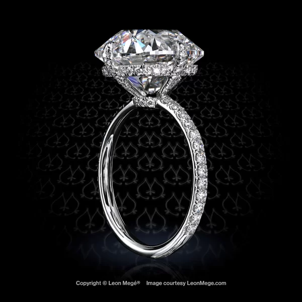 Leon Mege diamond solitaire ring with true antique cushion diamonds and micro pave in platinum bespoke design