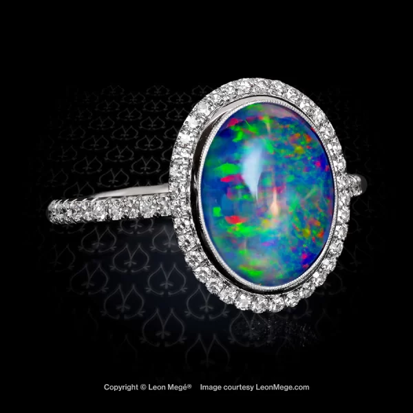 Custom made natural Australian opal set in a bezel with micro pave detail on the shank by Leon Mege.