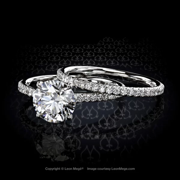 Leon Mege elegant micro pave diamond engagement ring with round diamond and matching wedding band