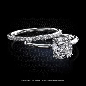 Plain elegant handmade hand-forged Leon Mege platinum Princessa solitaire with True Antique cushion diamonds