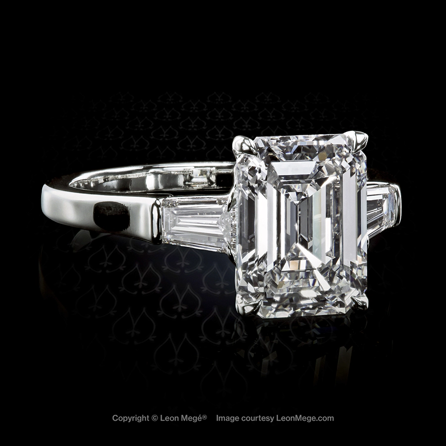 Leon Megé hand-forged three-stone ring featuring an emerald cut diamond and tapered baguettes in single-claw prongs r7588