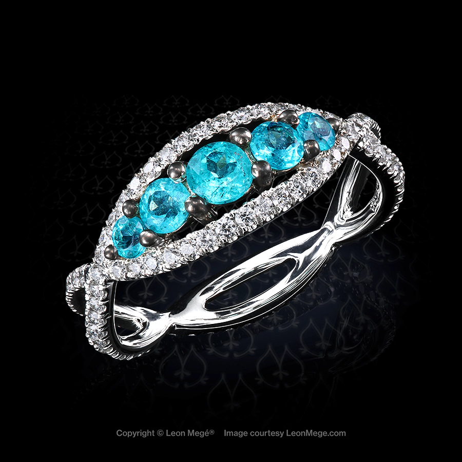Sweet micro pave ring with five natural Brazilian Paraiba gemstones set in platinum and antiqued 18K white gold by Leon Mege