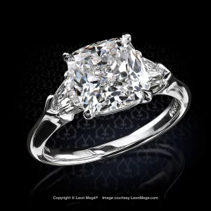 Leon Megé classic three-stone ring with a cushion diamond and pair of step-cut diamond bullets r8033