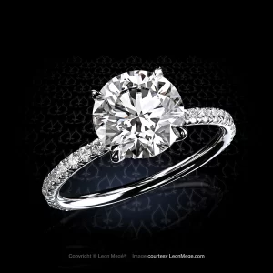 Hand made solitaire ring with ideal cut round diamonds and diamond micro pave on the shank by Leon Mege