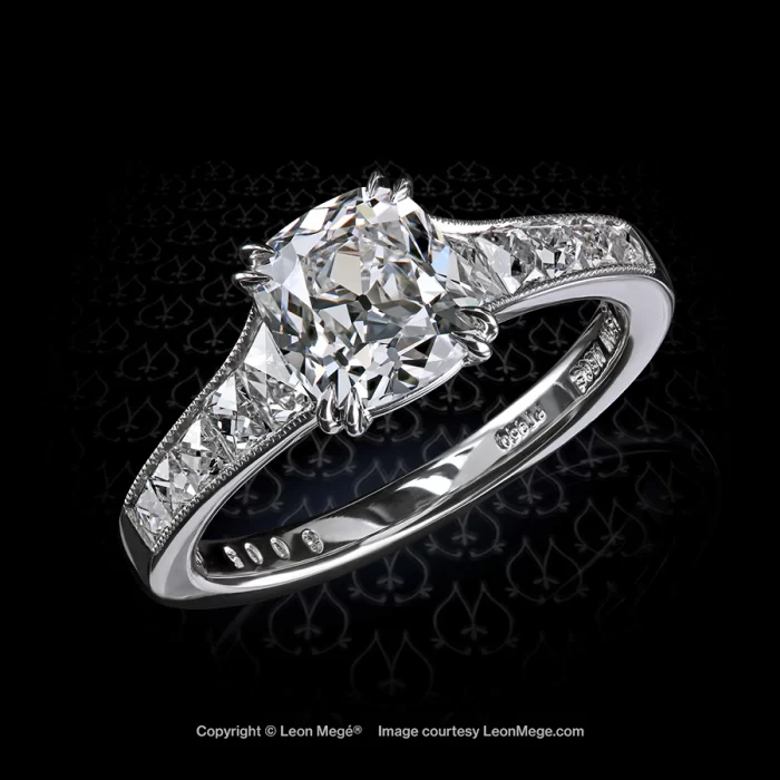 Mon Cheri Solitaire with cushion cut diamond and French cut diamonds channel set by Leon Mege