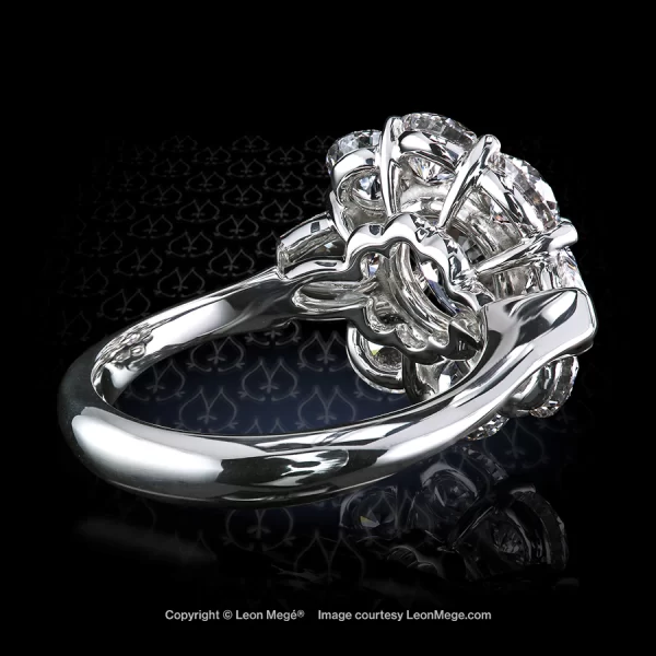 Leon Mege hand forged Cluster ring featuring 2.03 carat round diamond with round diamonds and pear shape diamonds