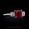 Classic three-stone ring featuring 2.06 carat asscher ruby by Leon Mege