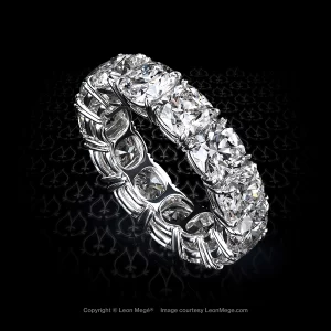 Eternity style wedding band with cushion cut diamonds in platinum by Leon Mege