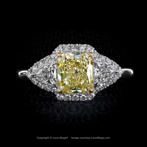 Montpassier™ three-stone ring with 1.25 carat fancy yellow diamond and diamond trillions and diamond micro pave by Leon Mege