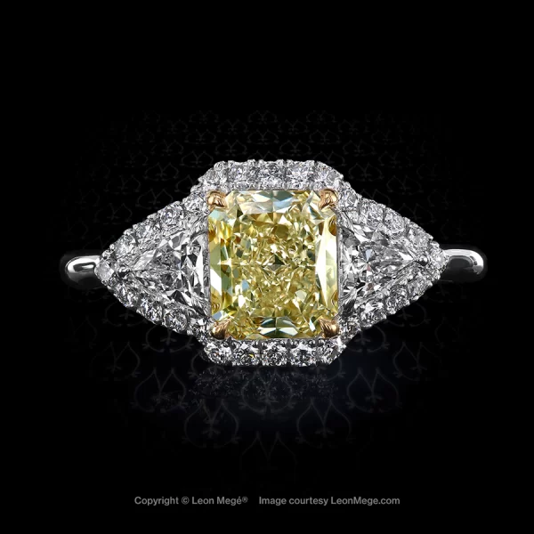 Montpassier™ three-stone ring with 1.25 carat fancy yellow diamond and diamond trillions and diamond micro pave by Leon Mege