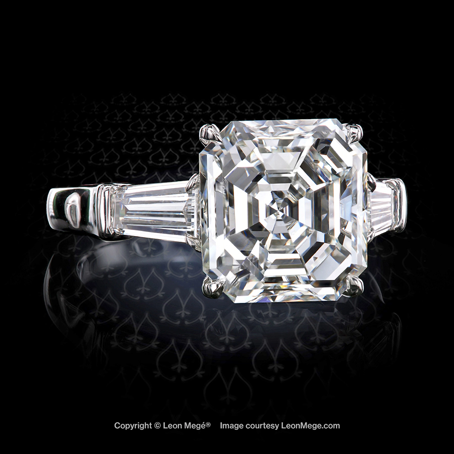 Leon Mege classic three-stone ring, featuring an Asscher cut diamond with tapered baguettes side stones