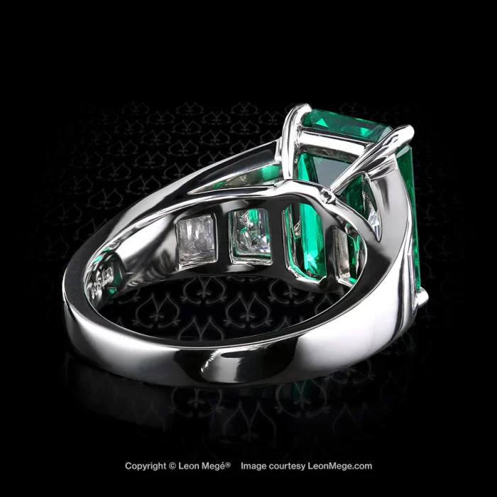 Leon Mege handmade colombian emerald ring with diamond trapezoids in platinum.