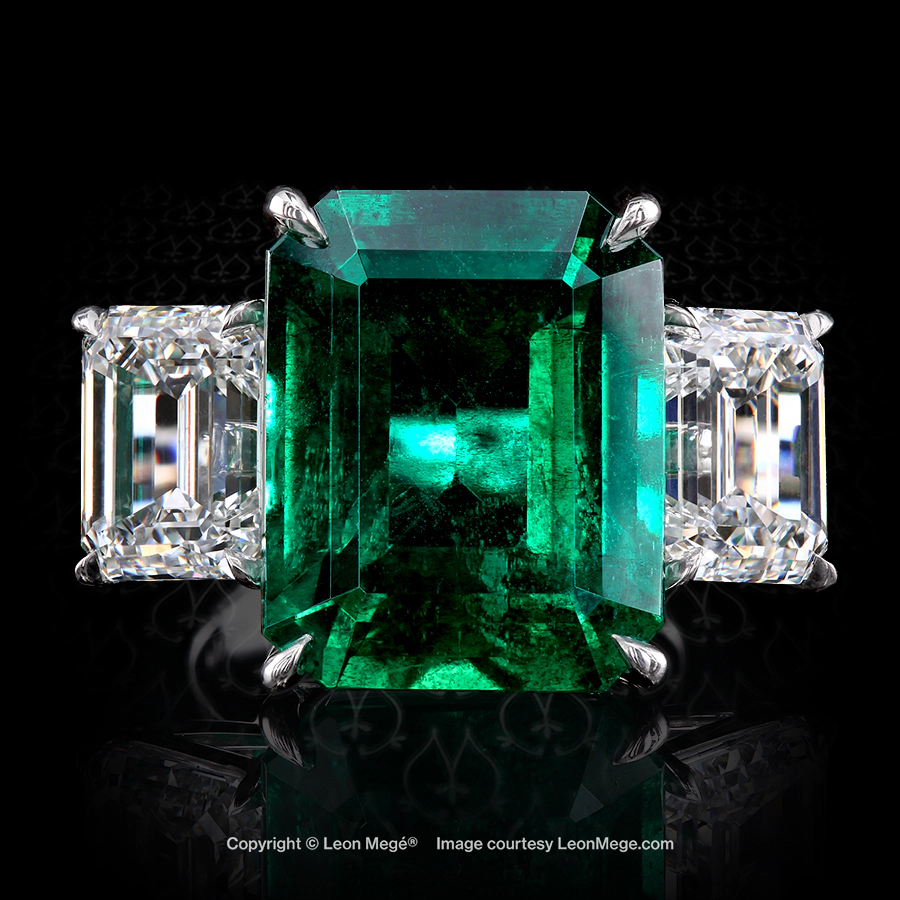Leon Megé statement trinity ring with a Colombian emerald and emerald-cut diamond side stones in a precision-forged platinum mounting r8067