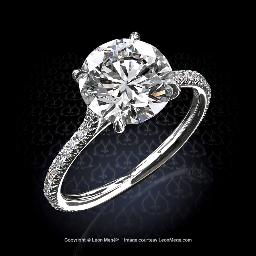 Leon Megé 401™ micro pave solitaire with a round diamond in four prongs on a cathedral shank r7818
