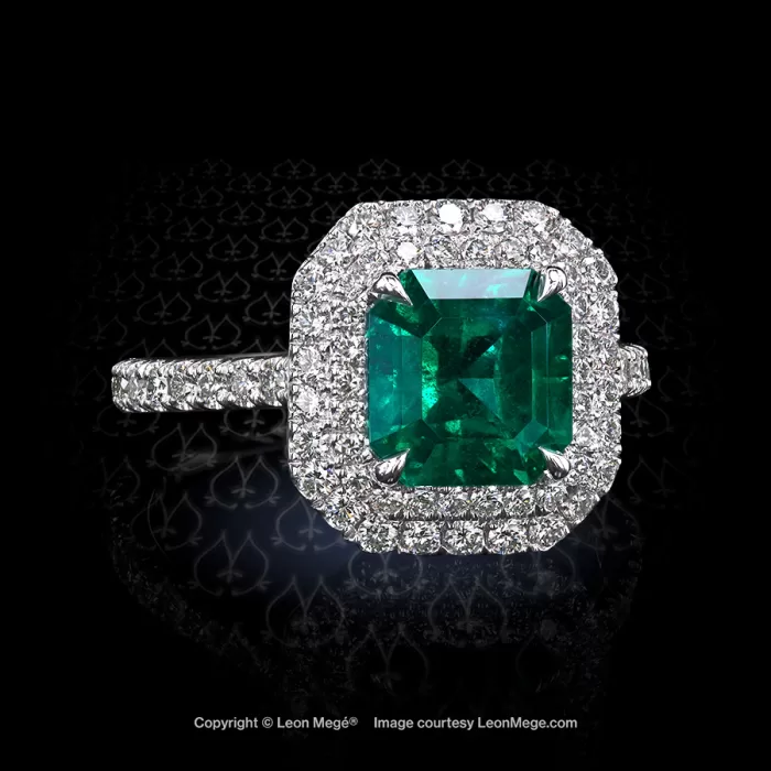 Leon Mege double halo ring with natural Colombian emerald and micro pave diamonds.