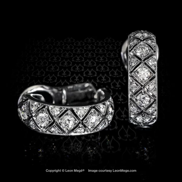 Leon Mege Art-Deco-styled hand-crafted clips in platinum set with natural diamonds.