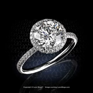 Round diamond halo ring with micro pave by Leon Mege