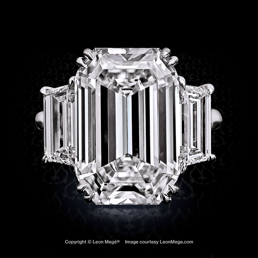 Leon Mege classic platinum three-stone ring set with an emerald cut and trapezoid diamonds r988