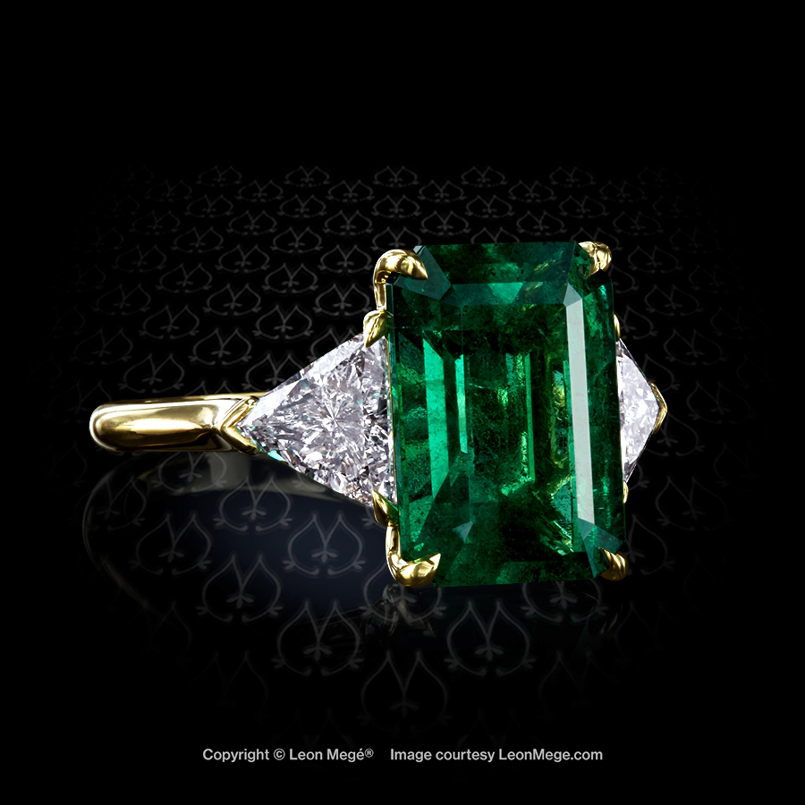 Leon Megé three-stone ring set with the finest Colombian emerald of superb clarity and color r7722