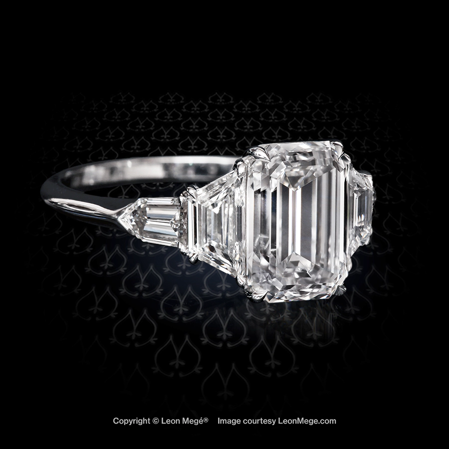 Five stone diamond engagement ring with emerald cut trapezoids and bullets by Leon Mege