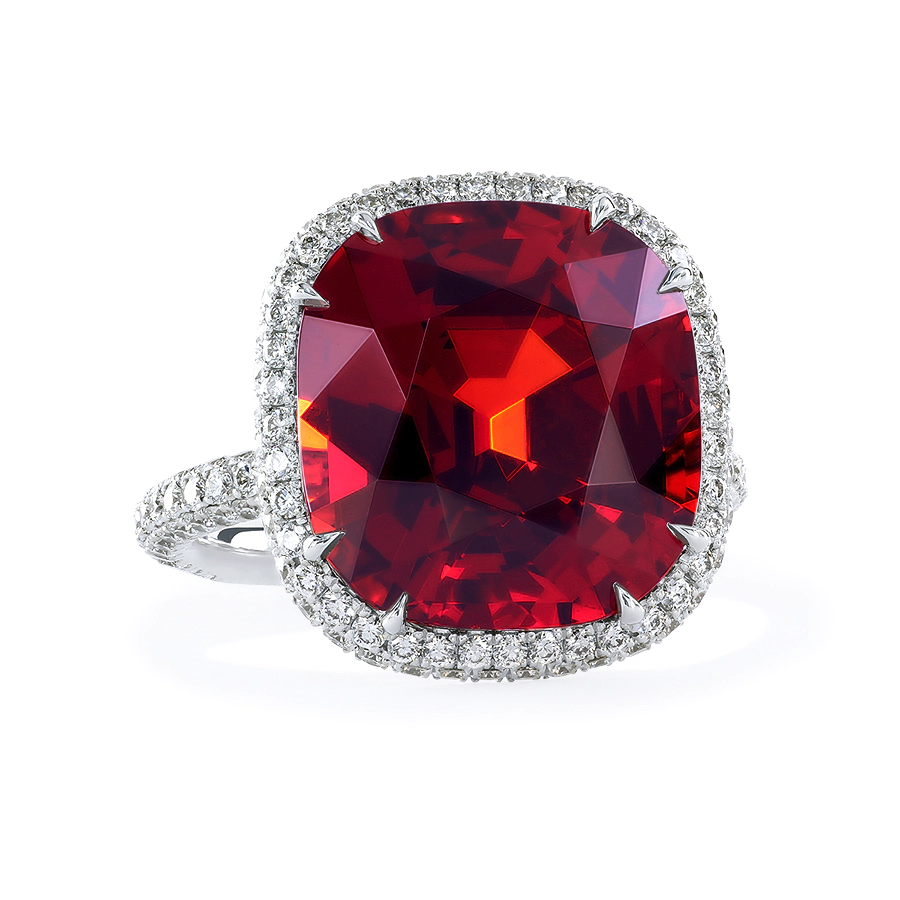 Custom right hand ring with orangy red spessartine garnet by Leon Mege.