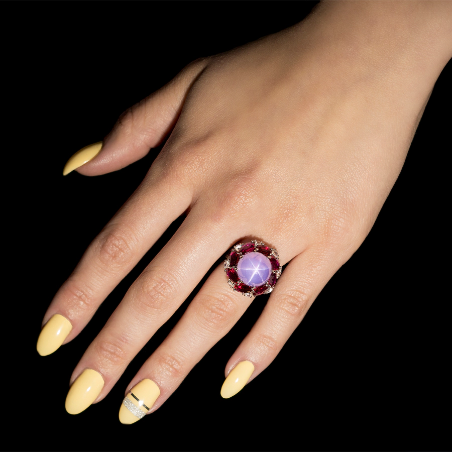 Leon Megé couture ring centering a star sapphire accented by sapphires, rubies and diamonds r7662
