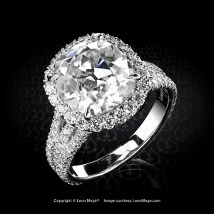 Leon Mege bespoke engagement ring with an antique cushion in a diamond halo and three-strand shank r8411