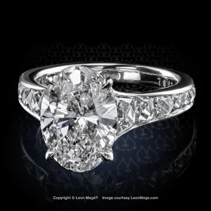 Leon Megé Mon Cheri™ solitaire with an oval diamond and graduated French cut diamonds r7603