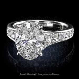 Leon Megé Mon Cheri™ solitaire with an oval diamond and graduated French cut diamonds r7603