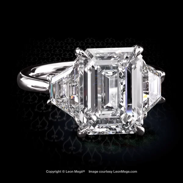 Leon Mege bespoke three-stone ring with an emerald cut diamond and trapezoids in platinum r8172