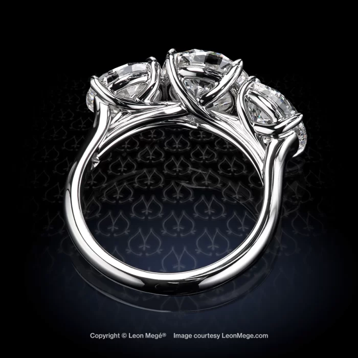 Leon Mege's three-stone trellis-style engagement ring with a round diamond is a delicate balance of ethereal beauty and a refined attitude r8371