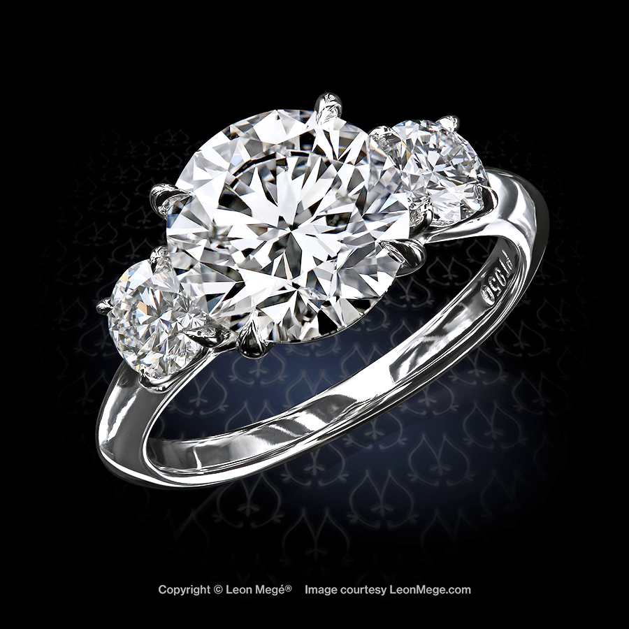 Leon Mege classic trinity ring, featuring 2.91-carat round diamond and round side stones.