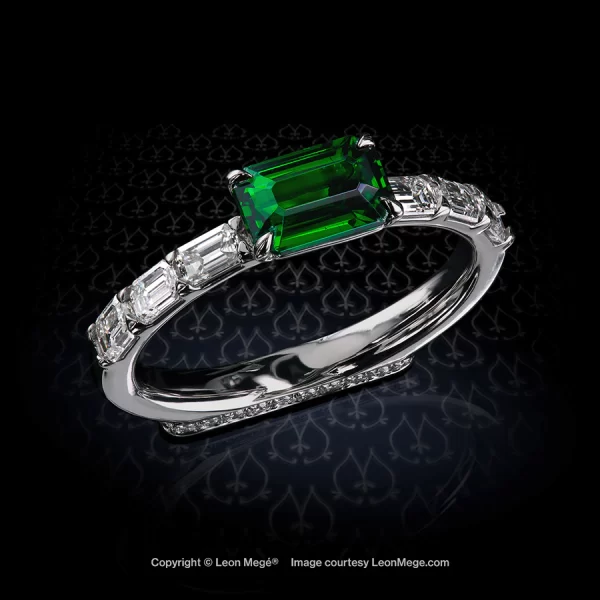 A beautiful combination of a natural tsavorite and emerald-cut diamonds in a reversible East-West Flamingo ring r8251