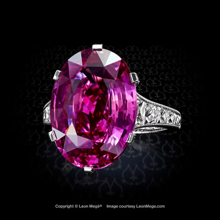 Oval pink sapphire and diamond statement ring by Leon Mege.