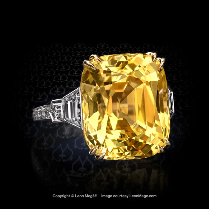 25-plus carat natural yellow sapphire in a bespoke handmade ring by Leon Mege featuring Balle-Evassee side stones and bright cut pave diamonds.