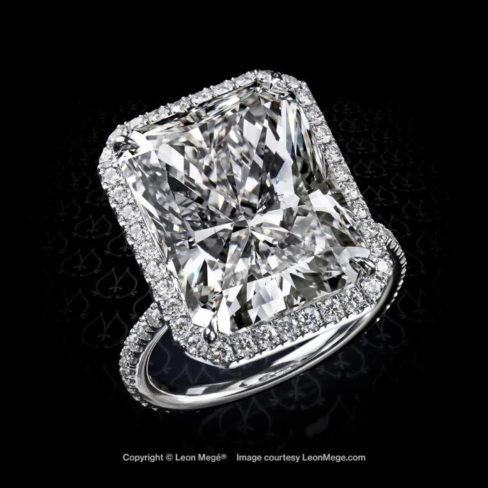 Leon Mege 811 halo ring features detailed micro pave wrapped around the stunning 13.27-carat radiant diamond.