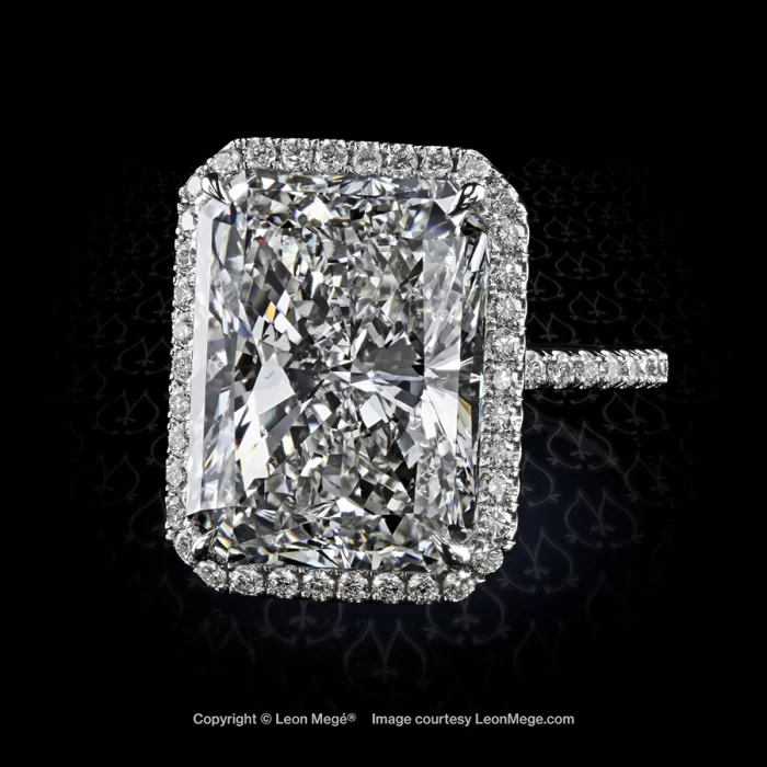 Leon Mege 811 halo ring features detailed micro pave wrapped around the stunning 13.27-carat radiant diamond.