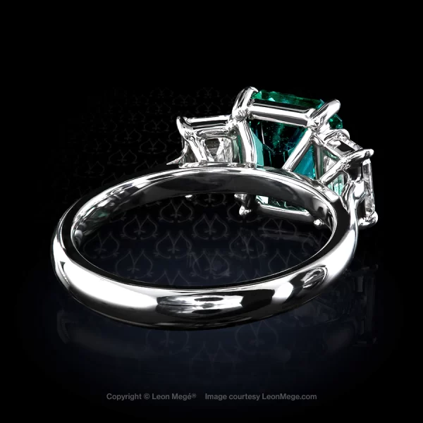 Leon Megé hand-forged three-stone ring with a Colombian emerald and step-cut diamonds r8164