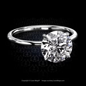 Leon Megé modern solitaire featuring a round diamond in a platinum mounting r5771