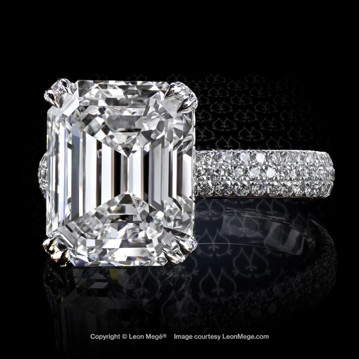 413™ solitaire ring, featuring 5.02 carat emerald diamond.