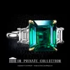 Leon Megé two-tone right-hand three-stone ring with a Colombian emerald and diamond trapezoids r8001
