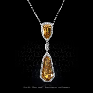 Leon Megé bespoke halo pendant, featuring natural fancy orange diamond shields p7115