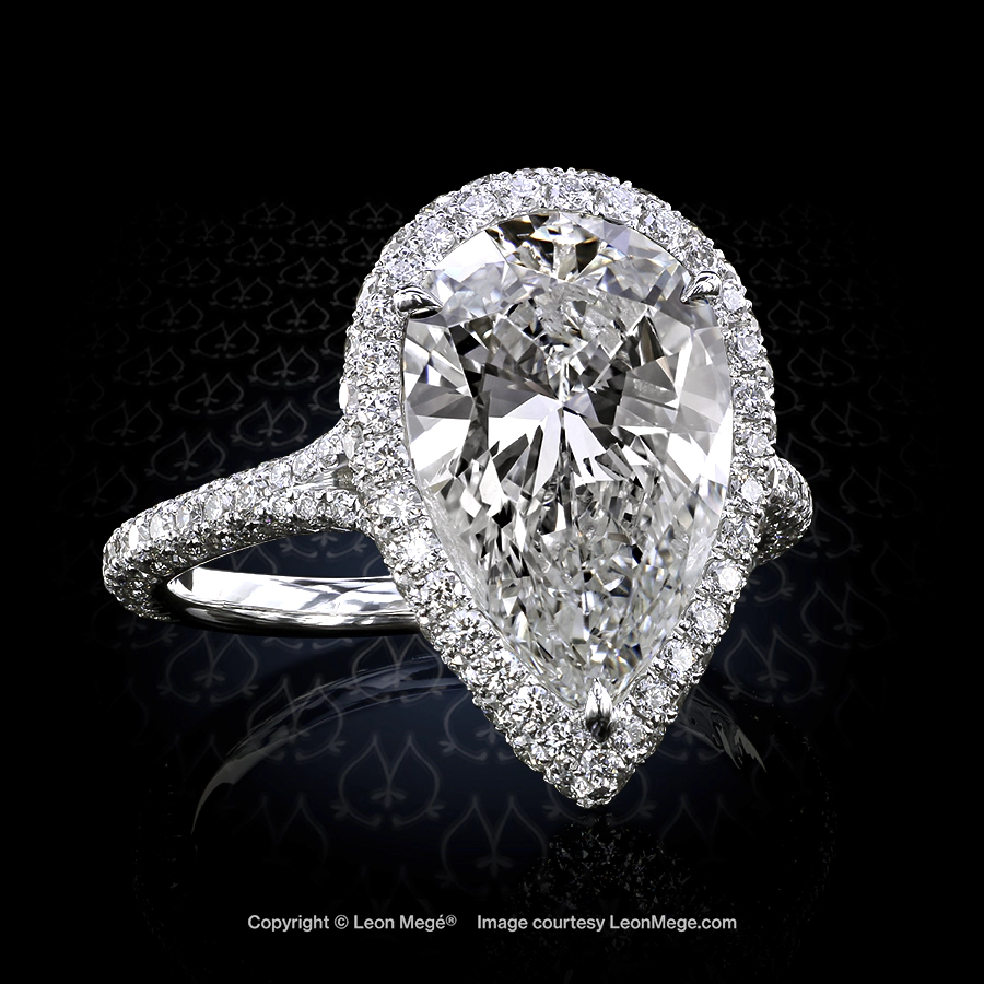 Leon Megé bespoke engagement ring with a pear-shaped diamond in micro-pave halo r7114