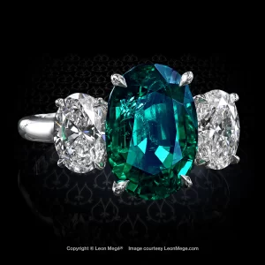 Leon Megé right-hand ring featuring a Colombian emerald flanked with two oval diamonds r7832