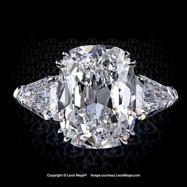 Leon Megé three-stone ring with an elongated classic cushion and step-cut diamond shields r8369