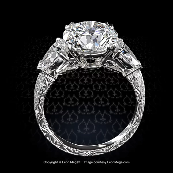 Leon Mege bespoke Montpassier™ three-stone ring with an oval diamond and micro pave r8526