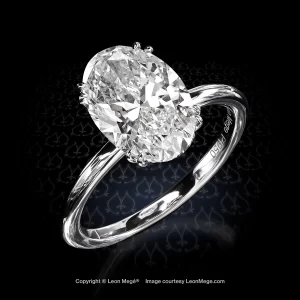 Leon Megé exquisite 410™ solitaire with an oval diamond and micro-pave on the basket r8527