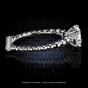Leon Mege elegant "Rosary" solitaire centering a stunning round diamond and finished with a crisp pave on the Podium™ base